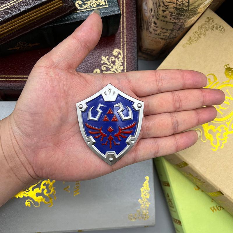 Hylian Shield Replica - The Legend of Zelda Timeless Defender 1:6 Zinc Alloy | Triforce Embossed Zinc Alloy & Royal Blue Enamel | Castle Town Heritage Display for Hyrule's Guardians - BlacksmithSONG